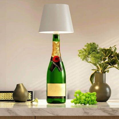 Wireless Bottle Lamp by Belro, modern electronic night light with sleek design, glowing softly in a dark setting.