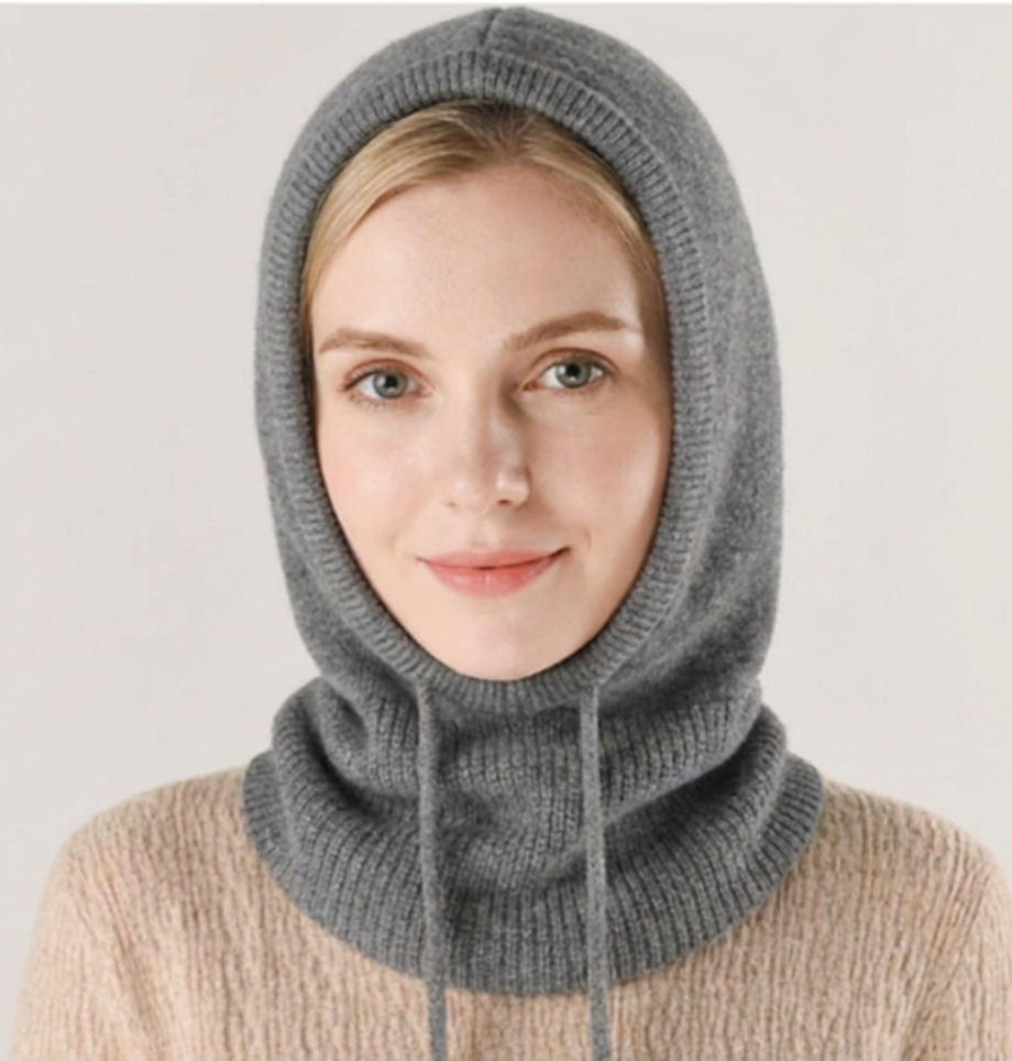 Soft beige cashmere knit beanie by BowLift, designed for warmth and comfort in cold weather, suitable for men and women.