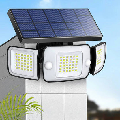 Belro solar powered flood lights with motion sensor illuminating an outdoor garden area at night.