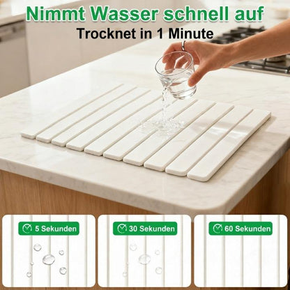 Mivoza diatomite stone dish drying mat, foldable and super absorbent, measuring 40x30cm, ideal for kitchen dish drying and organization.