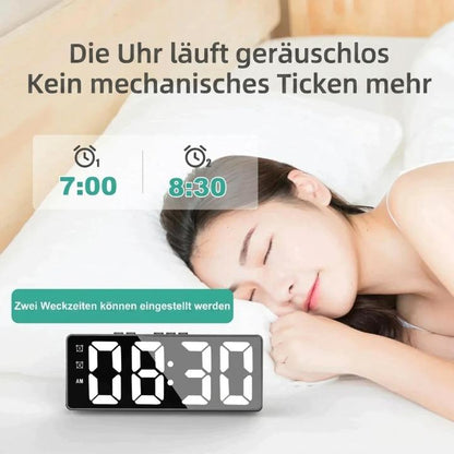 Digital alarm clock with built-in 2K security camera, HD video, motion detection, and Wi-Fi connectivity by Mivoza Deutschland.