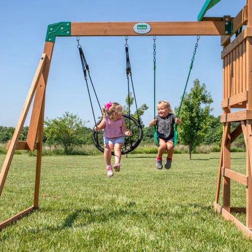 Casavibeo Backyard Discovery Grayson Peak Swing Set with wooden swing beam and colorful swings in a backyard setting