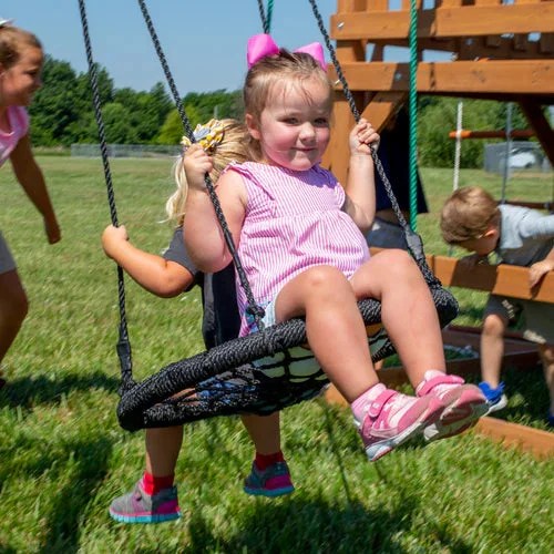 Casavibeo Backyard Discovery Grayson Peak swing set with web swing, colorful play components, and sturdy wooden frame for outdoor fun.