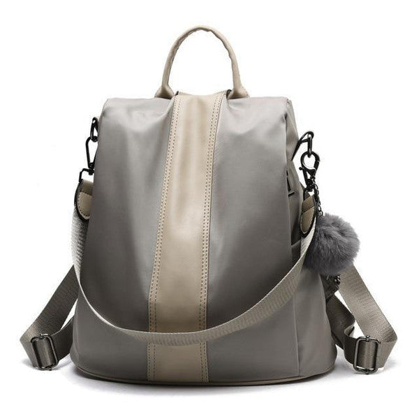 Belro anti-theft backpack with secure zipper closures and sleek design, shown with multiple compartments and padded shoulder straps.