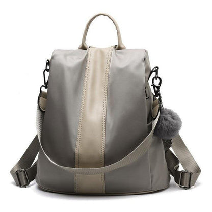 Belro anti-theft backpack with secure zipper closures and sleek design, shown with multiple compartments and padded shoulder straps.