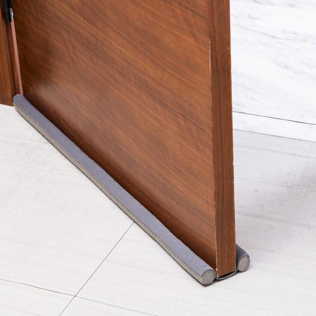 Belro garage weather stripping seal strip installed under a door for insulation and weatherproofing in a home garage.