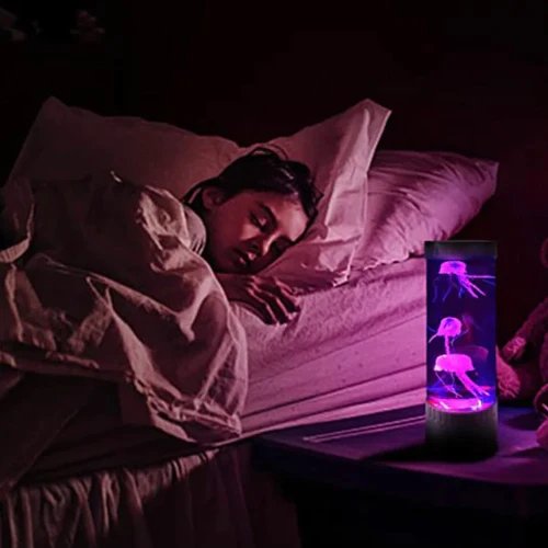 Belro LED jellyfish aquarium table night light illuminating a home decor setting with floating jellyfish design.