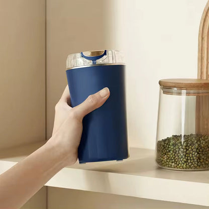 Belro electric mini grinder for home and kitchen use, showing compact design and grinding mechanism on a clean countertop.