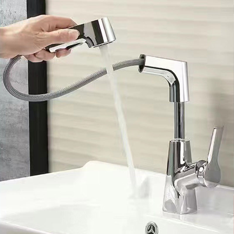Belro single-hole basin tap with pull-out spray head, metal finish, and modern design for kitchen or bathroom sink installation.