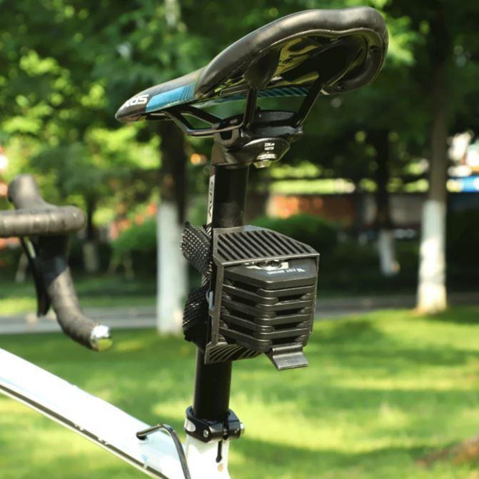 Belro foldable bike lock displayed outdoors, compact and portable for secure bicycle protection in home and garden settings.