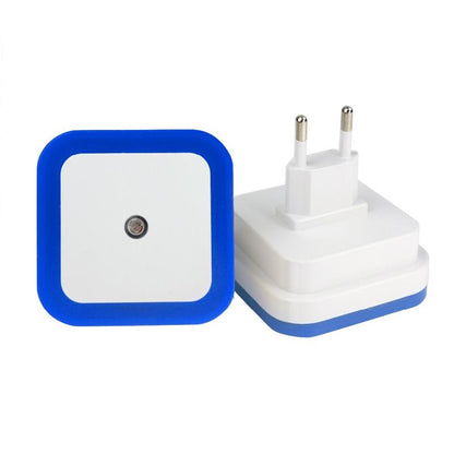 Belro plug-in motion detector smart outlet night light illuminating a hallway with automatic on/off sensor functionality.