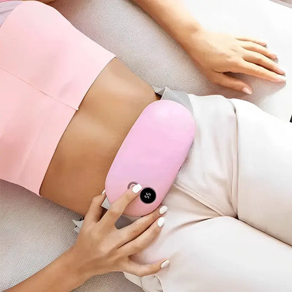 Pink Belro heating pad for menstrual pain relief, soft fabric cover, designed for comfort and targeted pain alleviation.