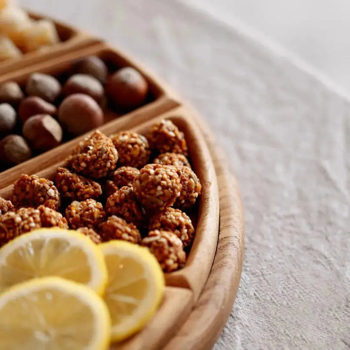 Wooden snack serving tray by Mivoza, stylish and versatile for kitchen or entertaining use, perfect for relaxed gatherings.