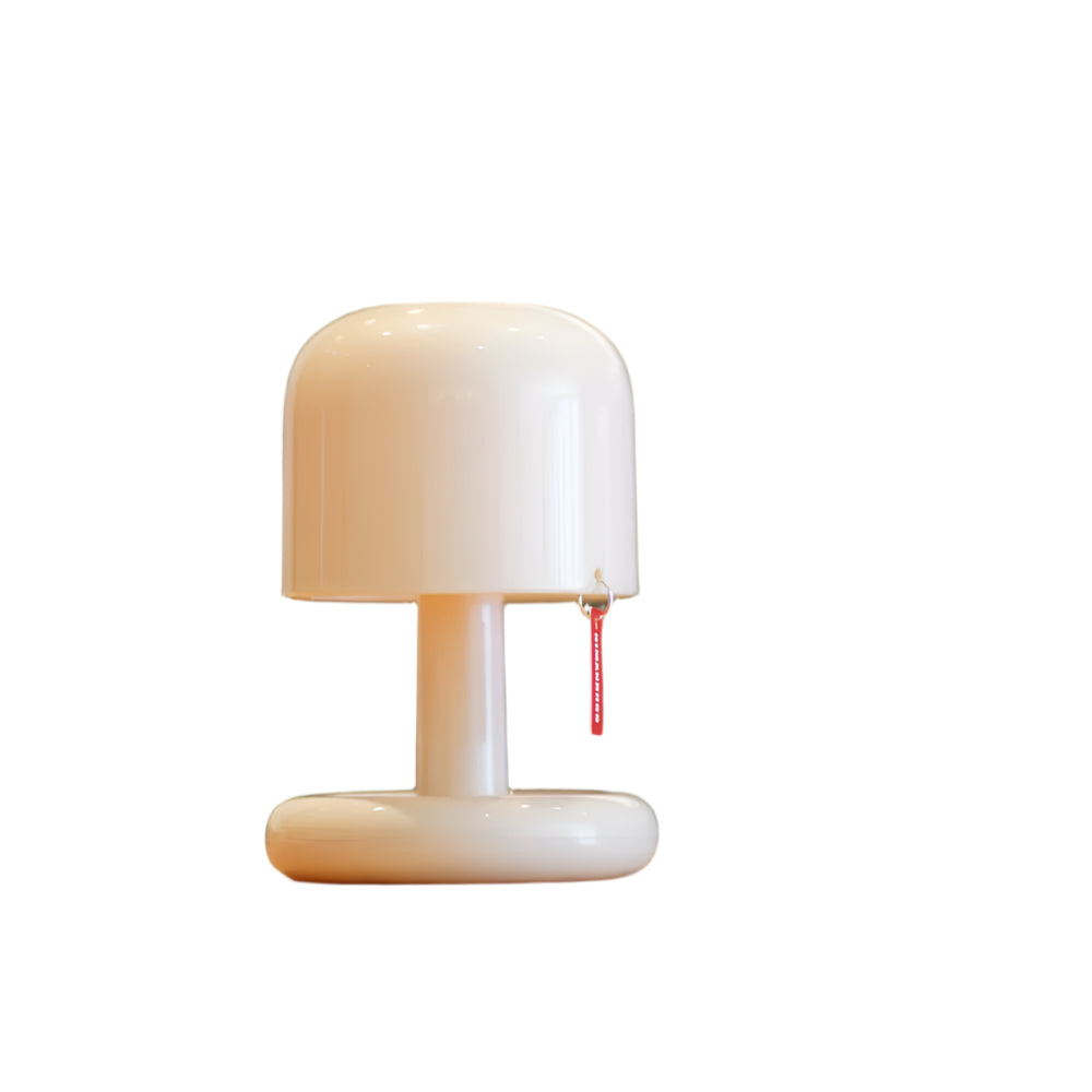 Belro Mini Sunset Light illuminating a room with warm sunset colors, compact electronic night light for relaxing ambiance.