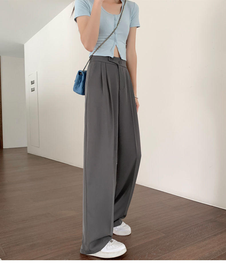 Belro pleated trousers showing a relaxed fit, made from lightweight fabric with a high waist and pleated front design.