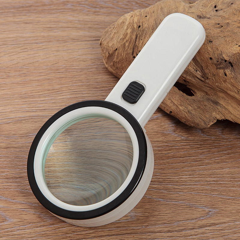 Belro 30x optical magnifier with built-in LED light, handheld device for detailed close-up viewing in electronics and optics.