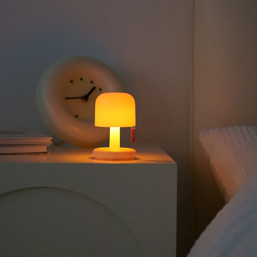Belro Mini Sunset Light illuminating a cozy room with warm orange and yellow sunset hues, ideal as a night light or ambient decor.
