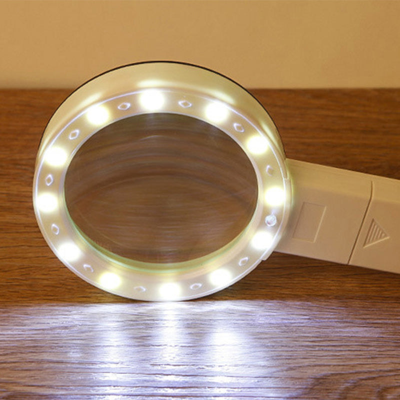Belro 30x optical magnifier with LED light, handheld device used for detailed viewing of small objects and fine details.