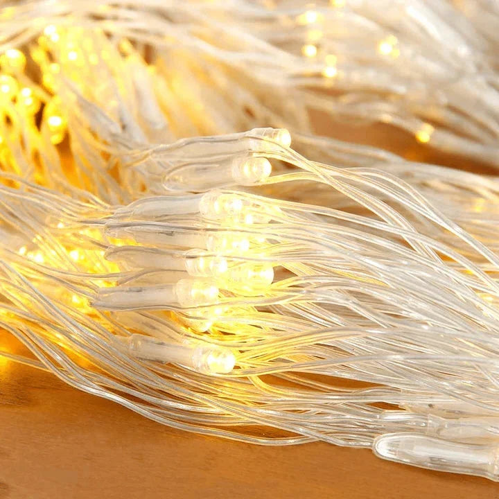 Belro LED net lights for outdoor home and garden decor, showing a grid of colorful illuminated LED lights on a garden trellis