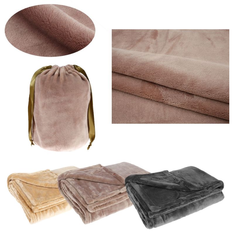 Belro cordless electric heated blanket spread out on a bed, showcasing its soft fabric and control panel for cozy warmth.
