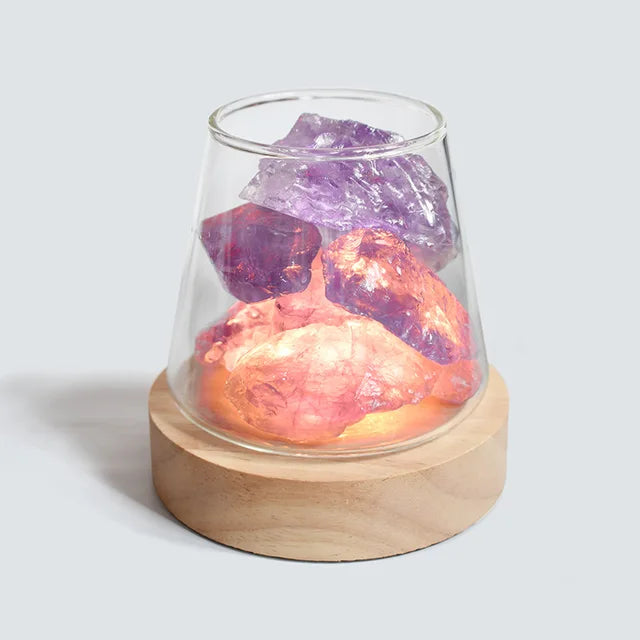 Belro Himalayan salt lamp night light with crystal structure and essential oil diffuser in a cozy setting.