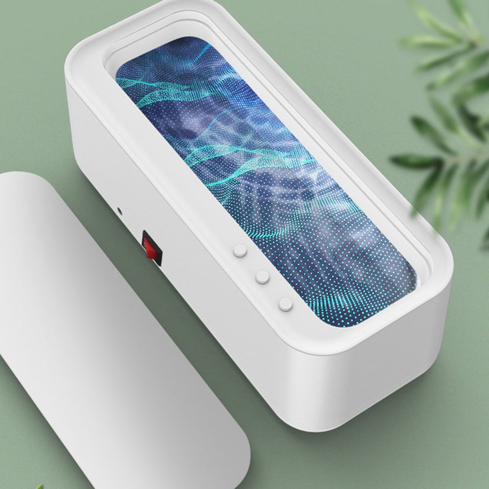 Belro high-frequency USB ultrasonic cleaner for home and outdoor use, showing the compact device with ultrasonic cleaning chamber.