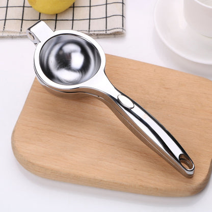 Stainless steel manual citrus press juicer by Belro for oranges and lemons, kitchen appliance for fresh juice extraction.