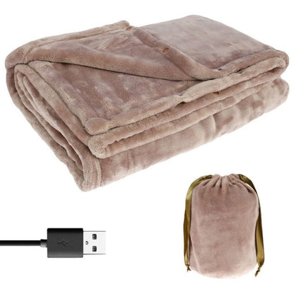 Belro cordless electric heated blanket draped over a bed, showcasing its soft fabric and control panel for adjustable warmth.