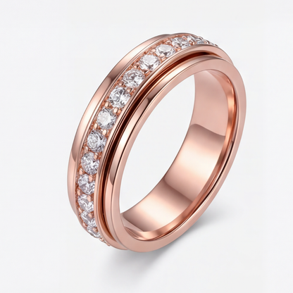 Mivoza zirconia spinning ring with crystal accents, elegant anti-anxiety rotating band jewelry, shown on a white background.