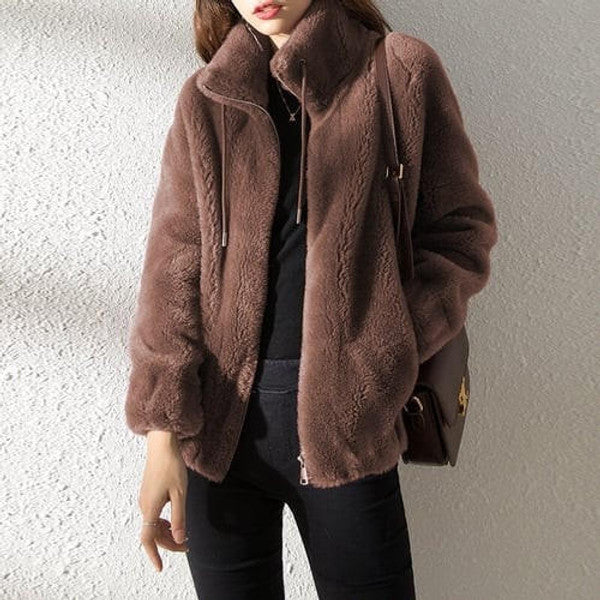 Belro high collar fur down jacket in black, featuring a warm, insulated design with a stylish fur-lined collar.