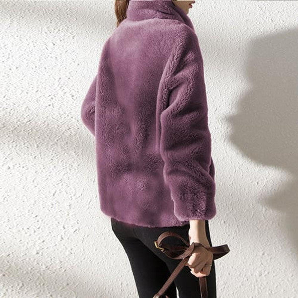 Belro high collar fur down jacket with a puffy design, featuring a warm fur-lined collar and sleek exterior.