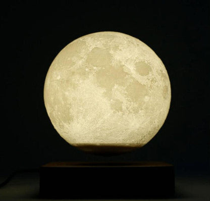 Belro magnetically levitated lunar lamp glowing in a dark room, showcasing innovative night light design with a realistic moon appearance.