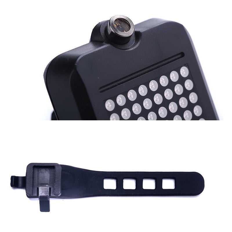 Belro Intelligent LED bicycle blinkers worn on men's clothing, featuring bright flashing lights for safety and visibility during cycling.