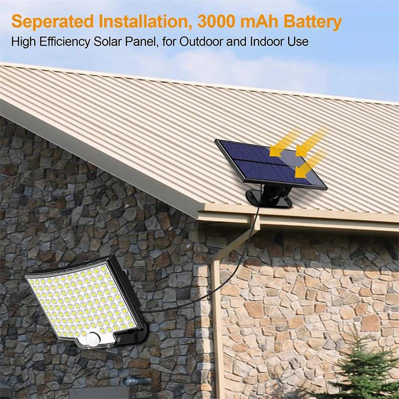Belro 106 LED solar outdoor light with motion sensor, mounted on garden wall, illuminating outdoor area at night