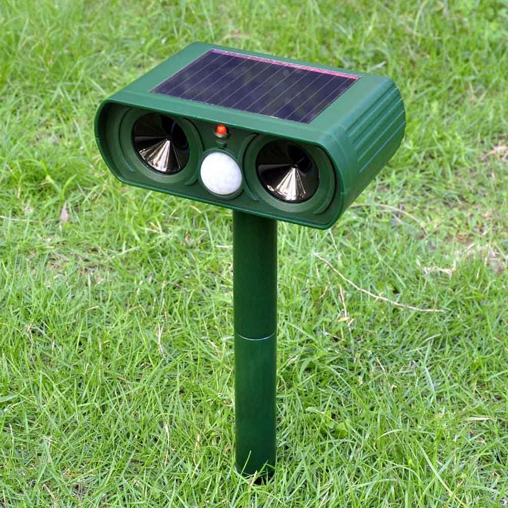 Solar-powered ultrasonic animal repellent by Belro, outdoor pest control device with solar panel and motion sensors.