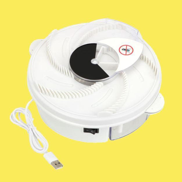Belro rotating electric fly trap with UV light and fan for indoor insect control, shown in operation.