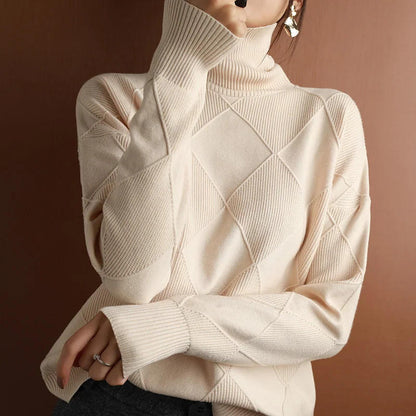 Plain cashmere roll neck sweater by Belro, showcasing soft fabric and classic fit in a close-up view.