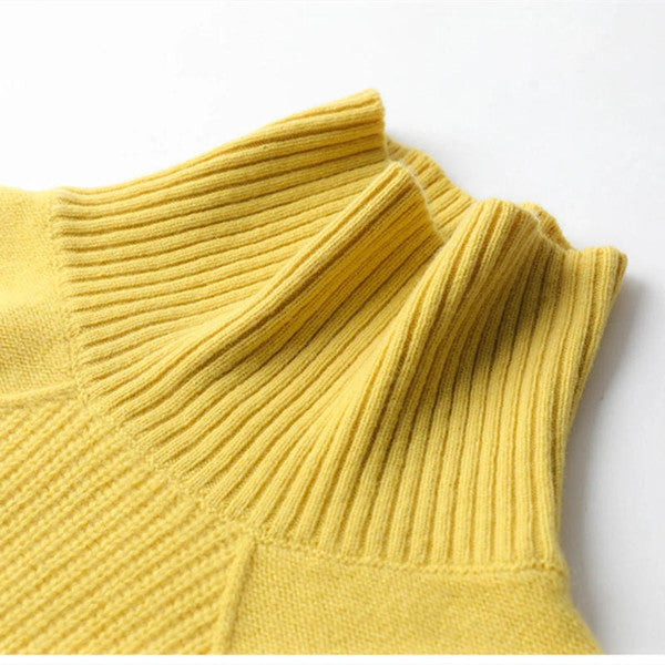 Belro plain cashmere roll neck sweater, featuring a cozy, smooth fabric in a neutral color, displayed on a mannequin.