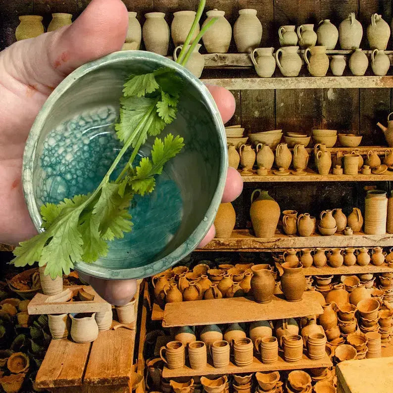 Rustic ceramic herb stripper by Mivoza, handcrafted kitchen tool for easily removing herbs, with a charming rustic design.