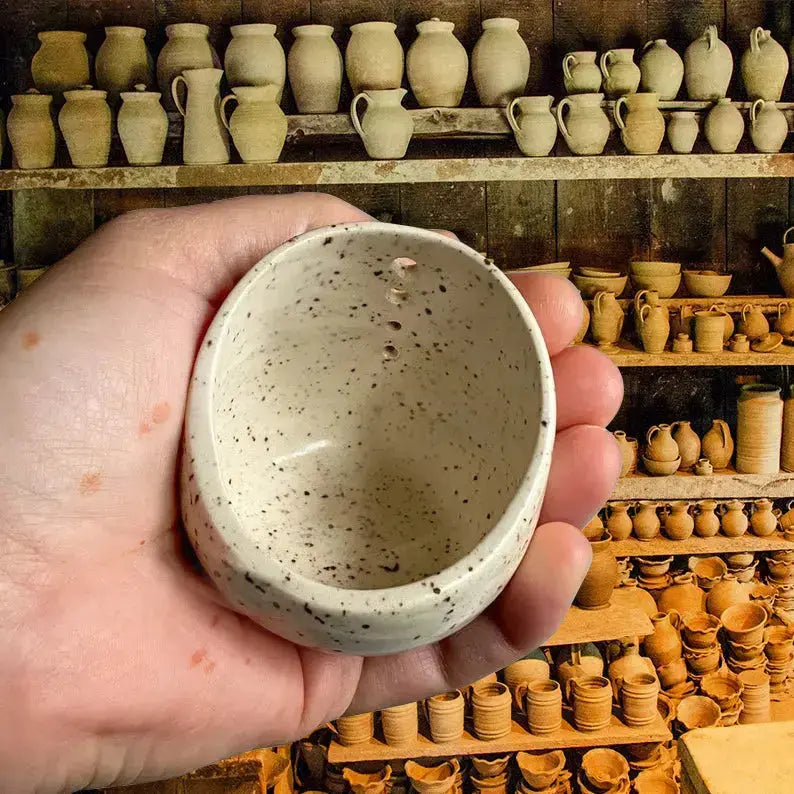 Rustic handcrafted ceramic herb stripper by Mivoza, kitchen tool designed for easily stripping herbs in the kitchen.