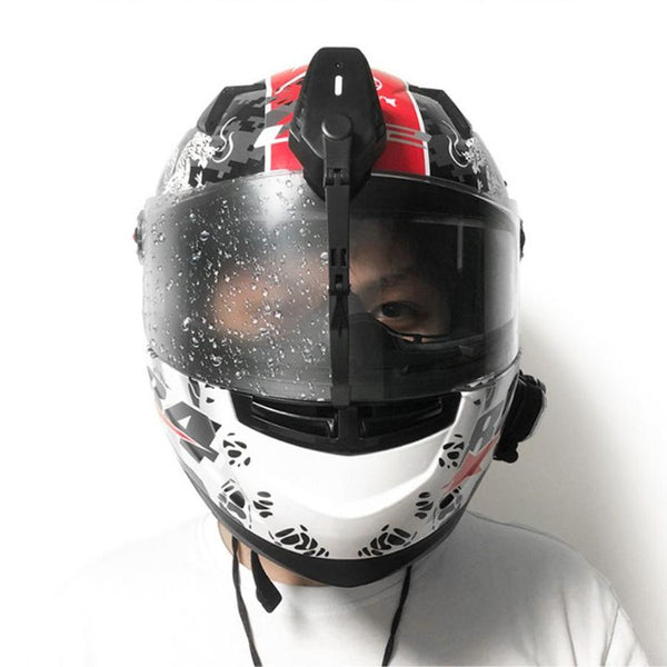 Belro motorcycle helmet windscreen wiper attached to helmet visor for clear visibility during rides.
