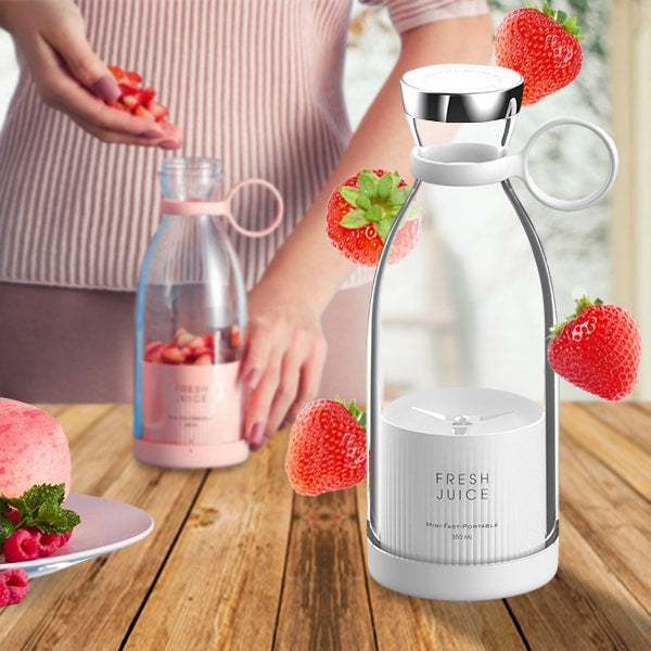 Belro juice blender for the road, compact kitchen appliance with a clear blending jar and modern design for portable use.