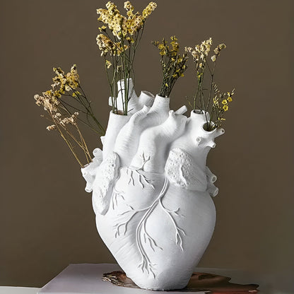 Heart-shaped vase made of bamboo and wood by Belro, perfect for home decor and garden accents.