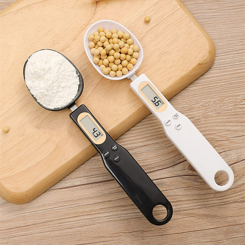 Digital measuring spoon by Belro with digital display, used for precise measurements in kitchen or electronic power applications.