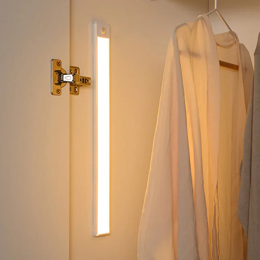 Belro motion sensor closet cabinet light mounted inside a wooden cabinet, providing automatic illumination for home storage spaces.