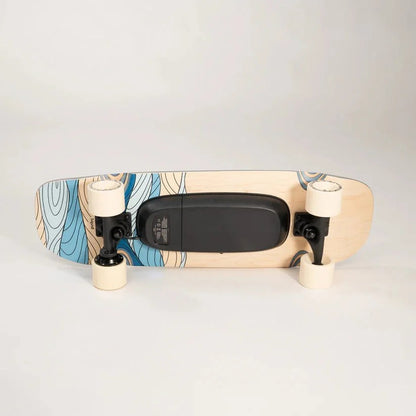 Bottom view of Casavibeo Liquid Skateboard LQS-1 showing sleek deck design and ergonomic grip tape for smooth riding.