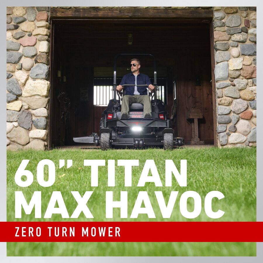 Toro TITAN® MAX Havoc™ Edition 60-inch zero-turn mower with 26 HP engine and 747cc engine, shown in a yard setting.