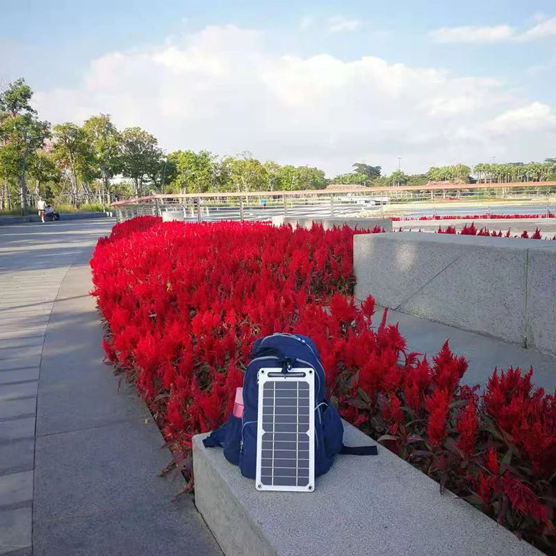 Belro waterproof solar panel with portable USB battery for charging devices outdoors, outdoor electronics power solution.