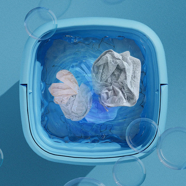 Mini folding washing machine by Belro, compact outdoor home appliance with control panel and foldable design for easy storage.