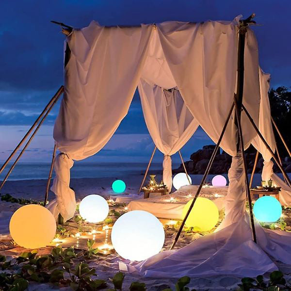 Belro inflatable waterproof pool lamp glowing in a backyard pool, perfect for outdoor home and garden lighting.